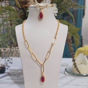 Elegant 18k Gold Plated Necklace on a Red Gemstone Pendant.